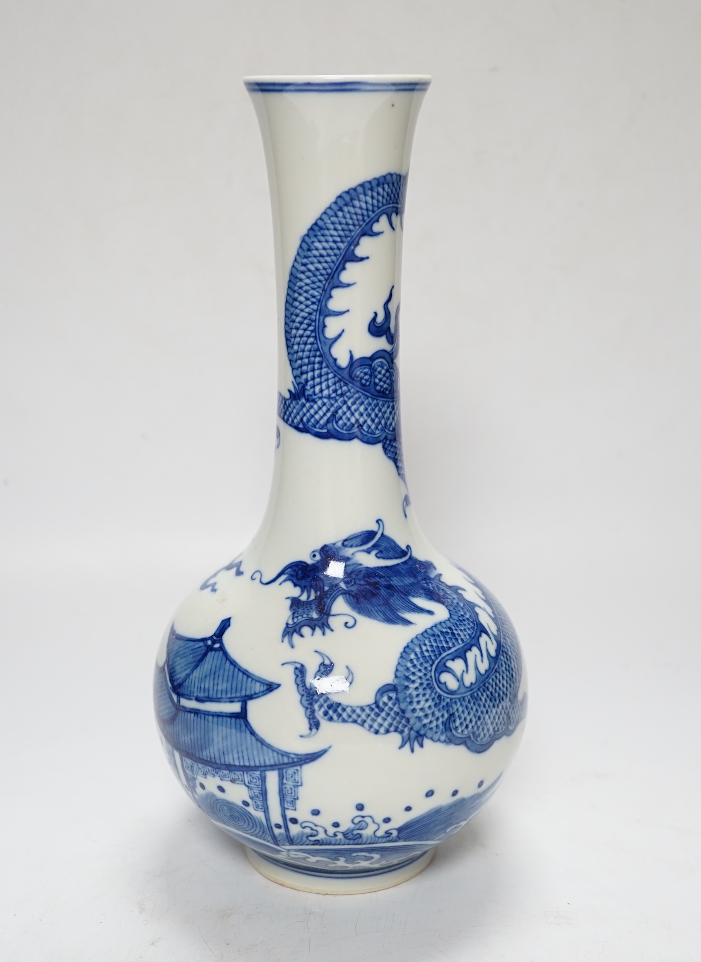 A Chinese blue and white dragon vase, 27cm high